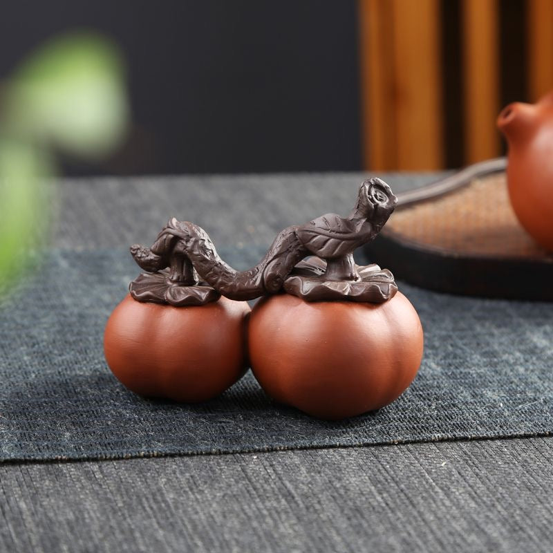 Mascota de té Caqui "Shishi Ruy